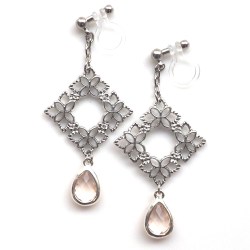 <img src=”silver-flower-motif-sqaure-and-pink-teardrop-crystal-invisible-clip-on-earrings5.jpg” alt=”pierced look and comfortable dangle silver flower filigree and pink crystal invisible clip on earrings”/>