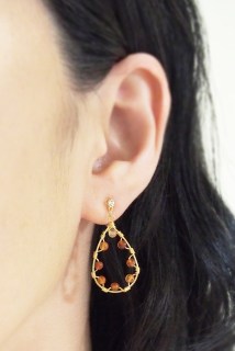 <img src=”comfortable-dangle-orange-carnerian-gemstone-invisible-clip-on-hoop-earrings.jpg” alt=”pierced look and comfortable https:”/>